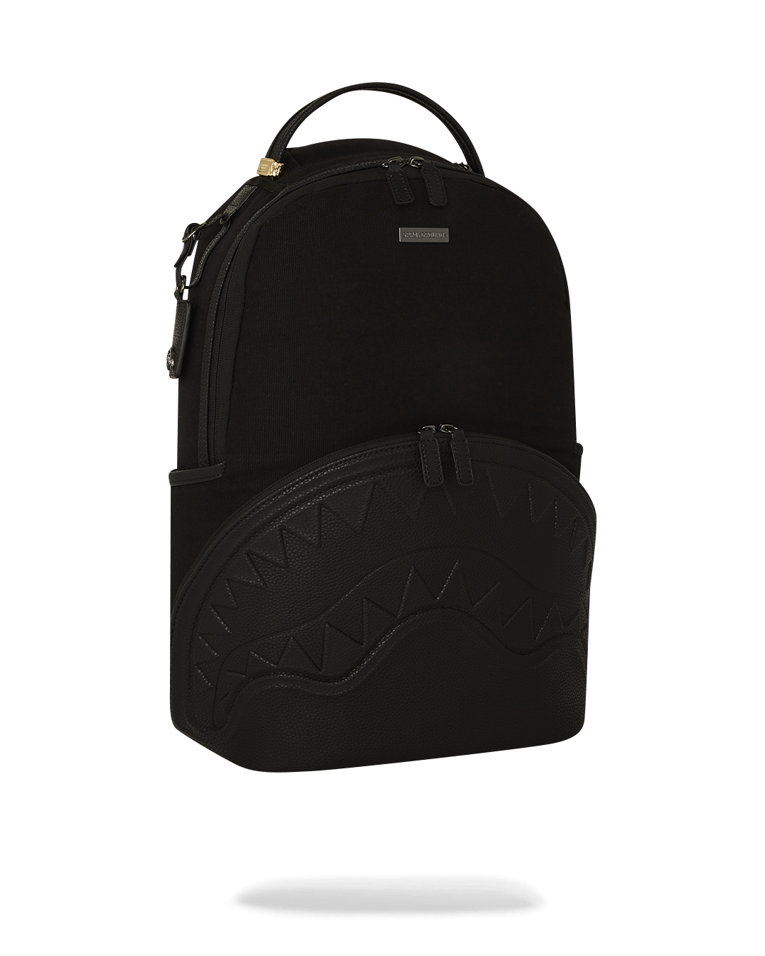 Canvas backpack with adjustable straps and gold zippers, perfect for travel and daily use.