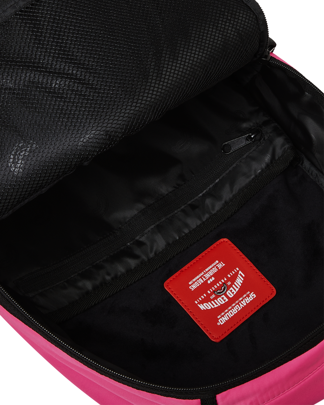 Top view revealing velour laptop compartment and mesh organizer