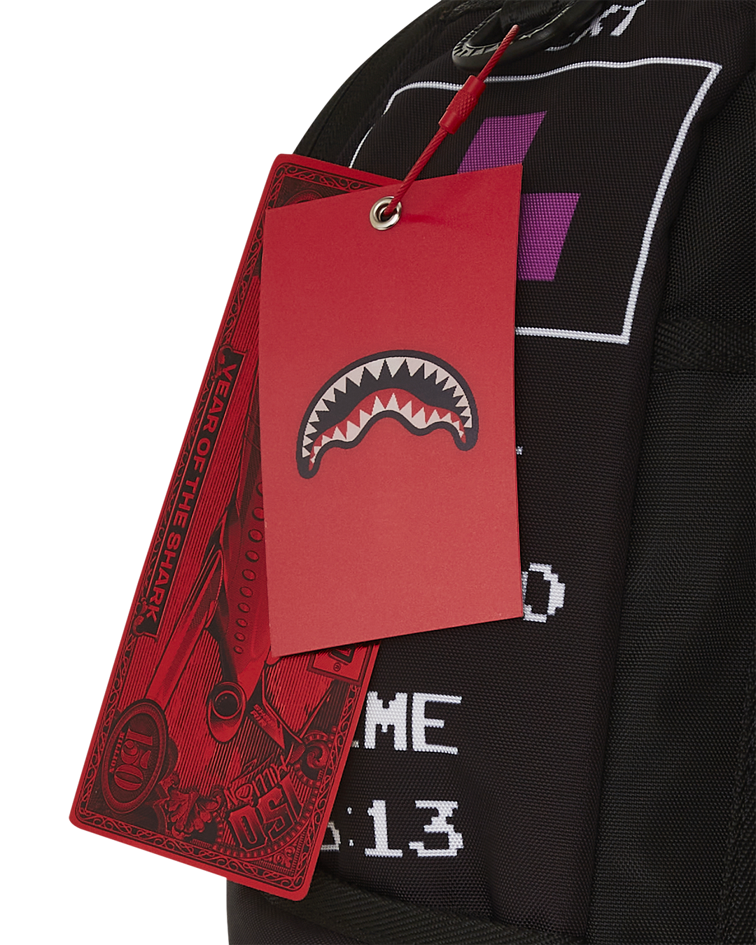 Front angle of the Tetris backpack showing Diablo art and gold zippers
