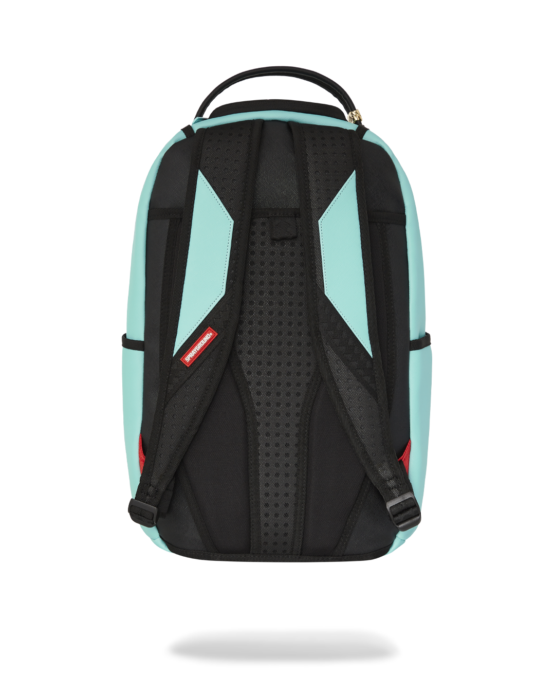 Shark Central backpack open, displaying interior velour laptop compartment and organizer pockets.
