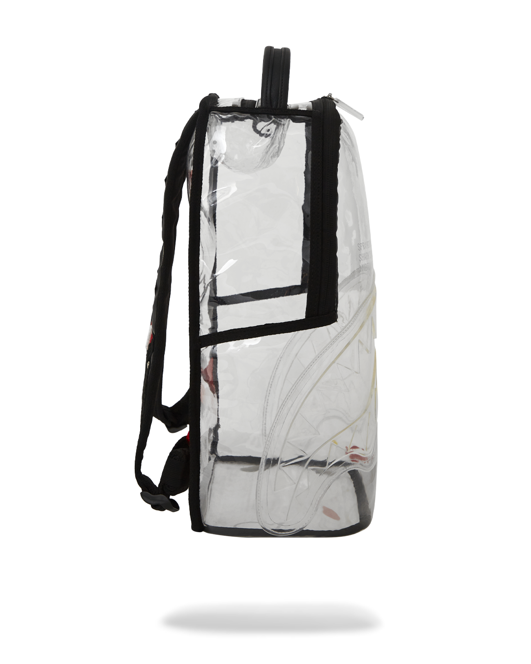 Close-up of the backpacks front zipper pocket and sharkmouth design.