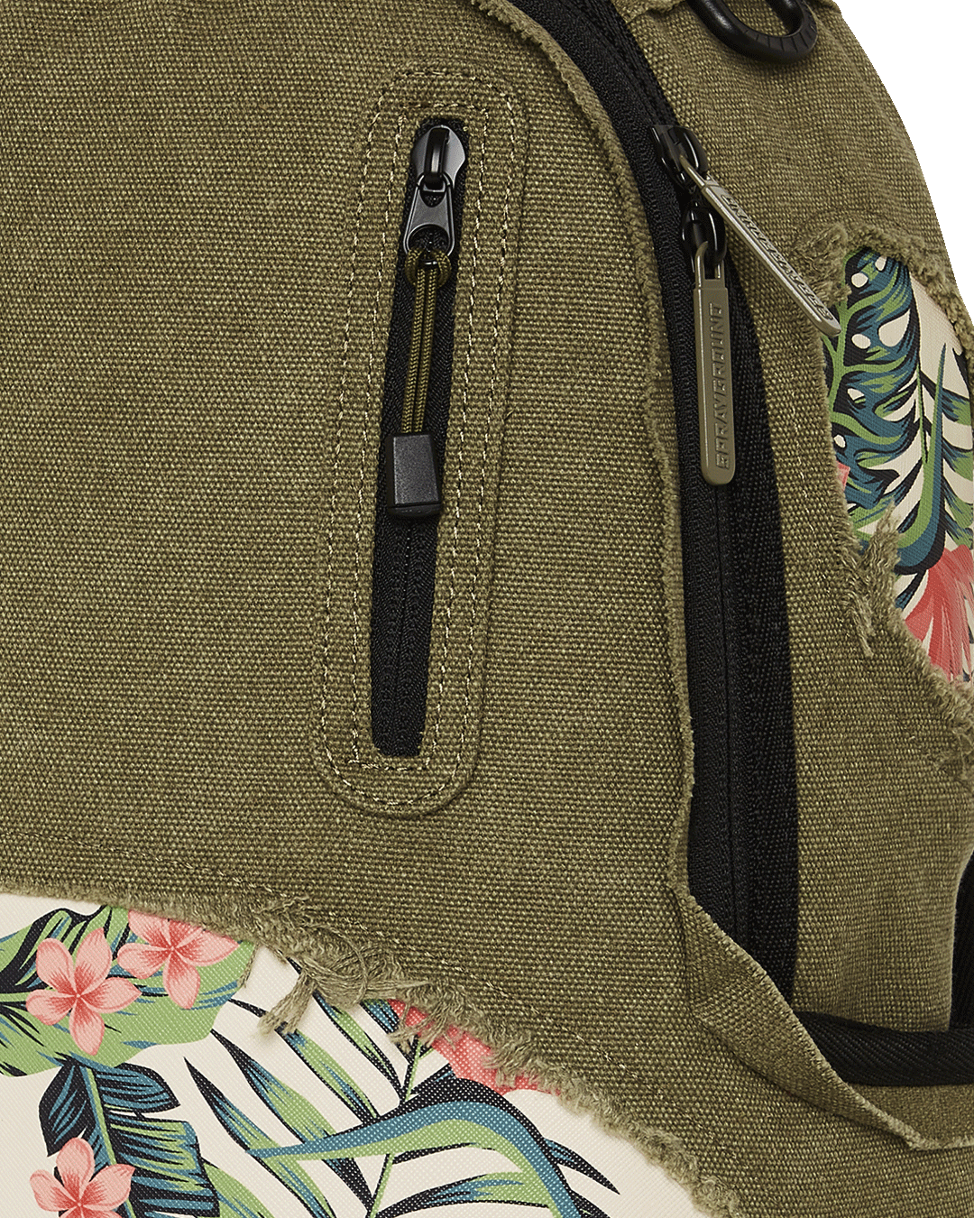 Interior laptop compartment of tactical sling backpack with mesh organizer pocket