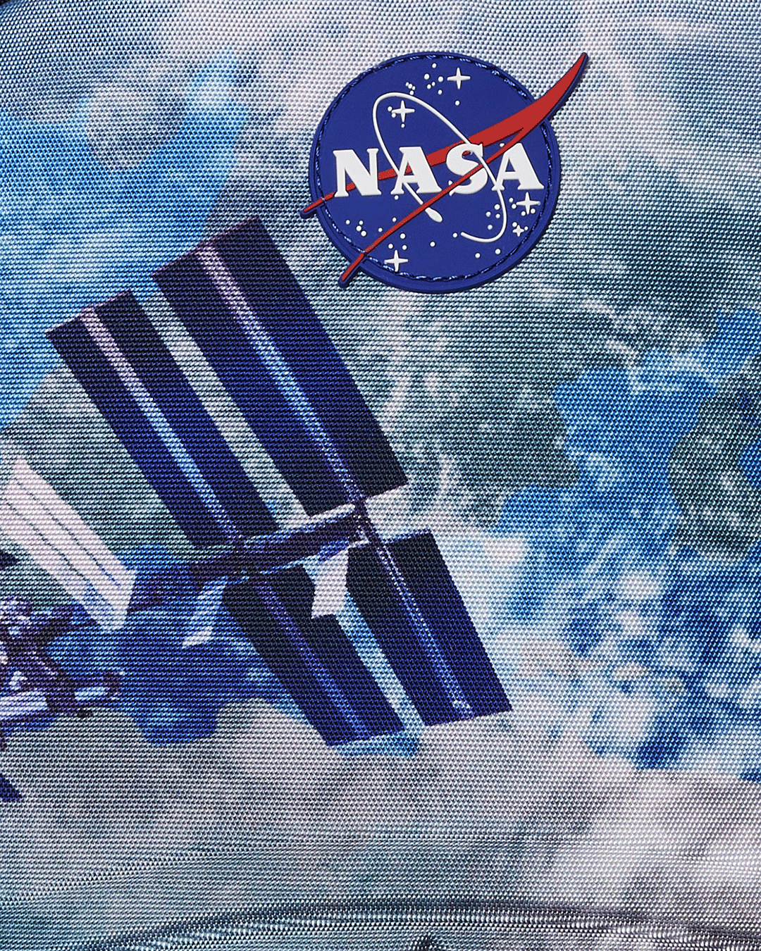 Sprayground NASA Collaboration Limited Edition Laptop Backpack from the front, showcasing its embossed design and front zipper pocket.