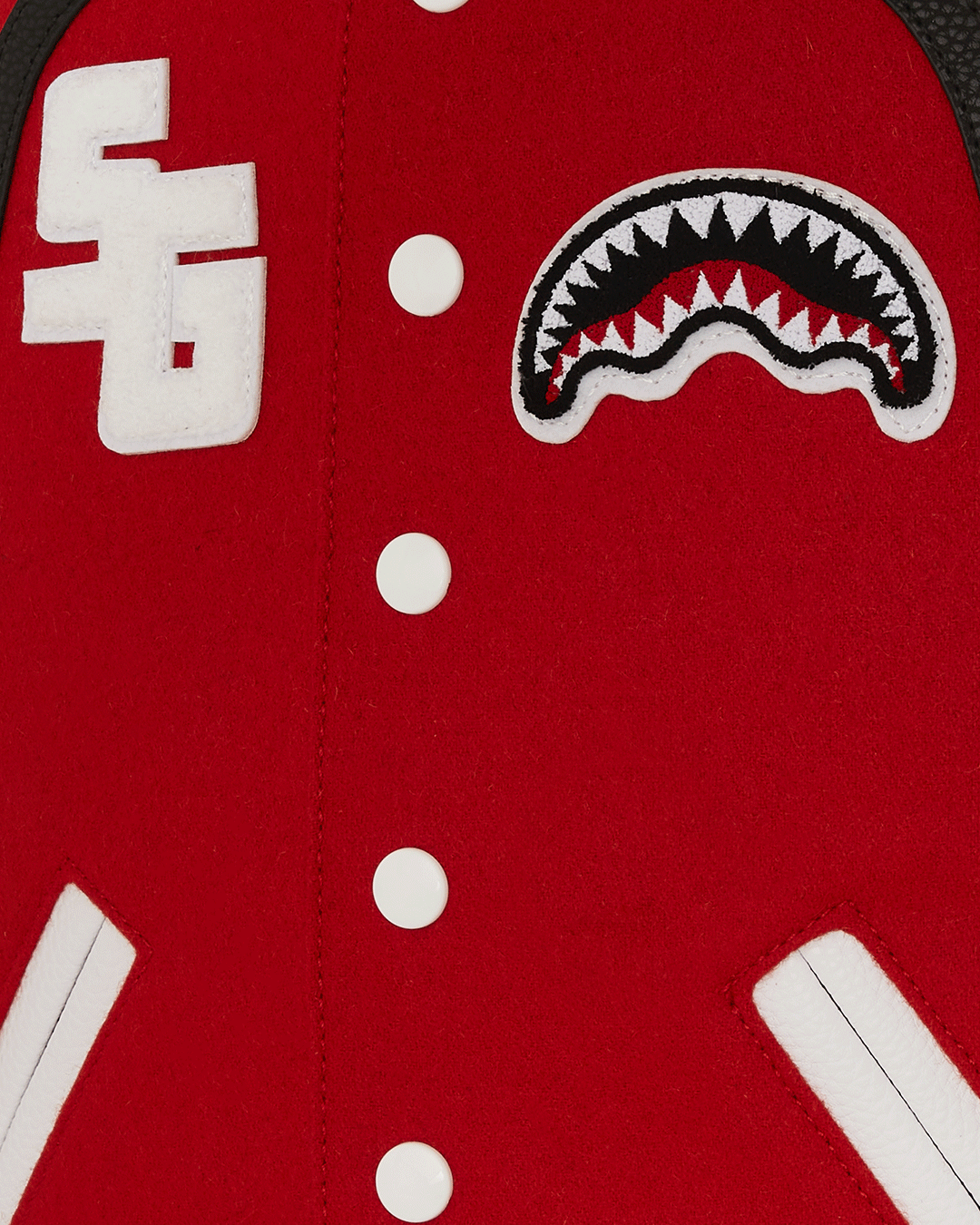 Sprayground U. Backpack front view, highlighting its modern design and glossy PVC accents