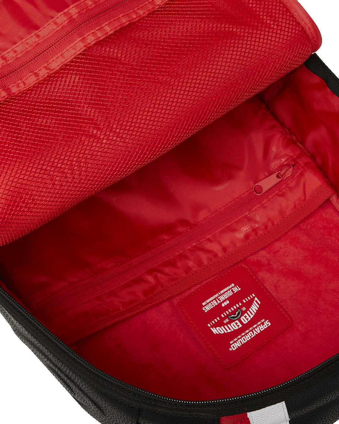 Interior view displaying the laptop compartment and organizer pocket.