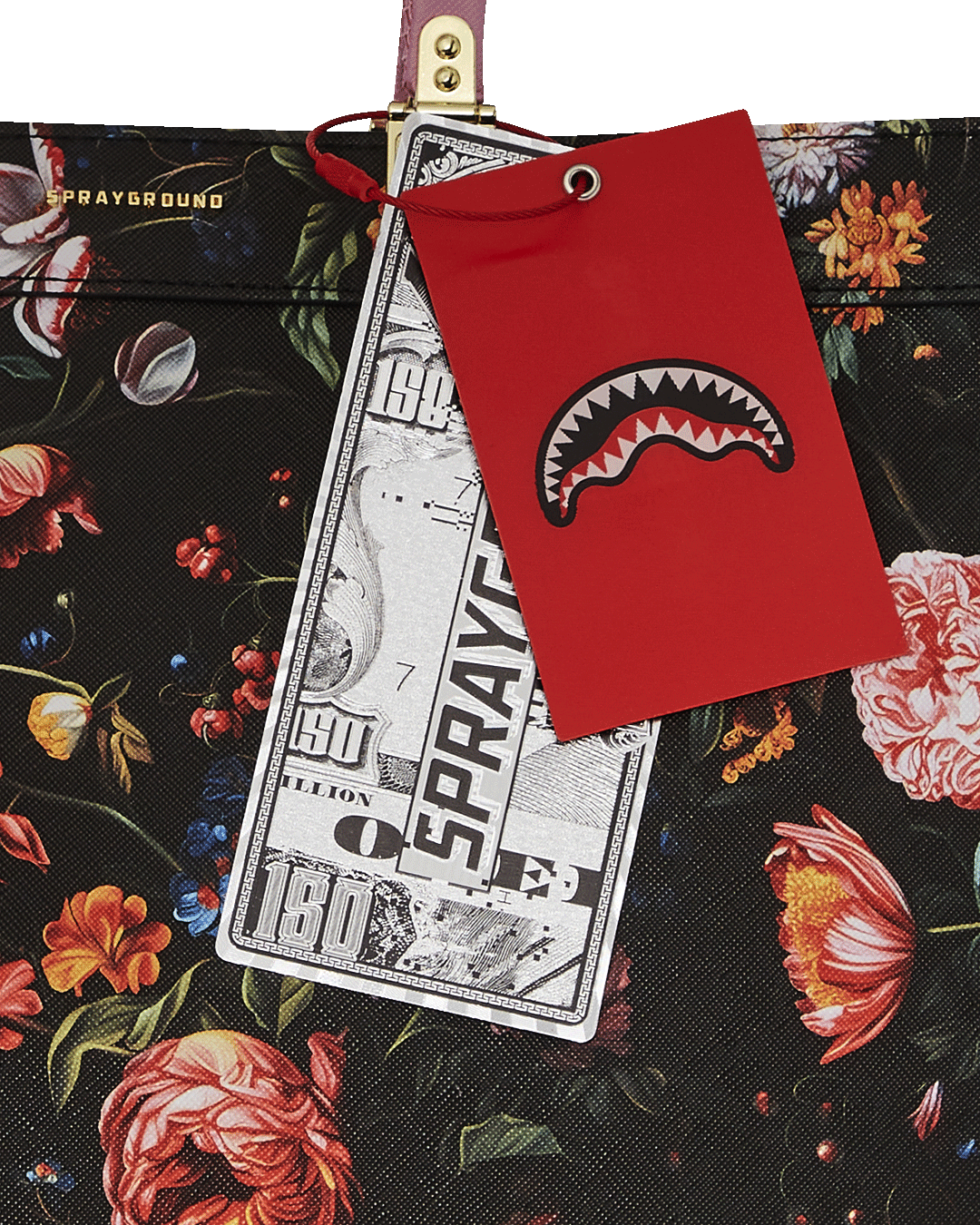 Cross-body strap attached to the printed tote bag for versatile wear