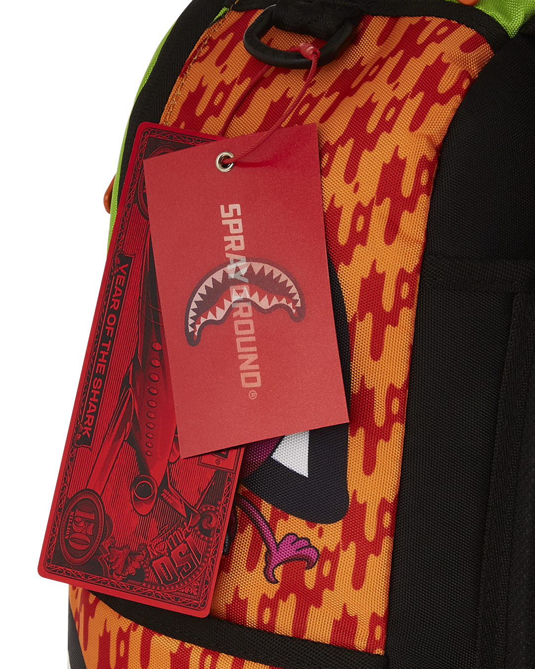Front view of the sprayground nickelodeon backpack showing bold character graphics.