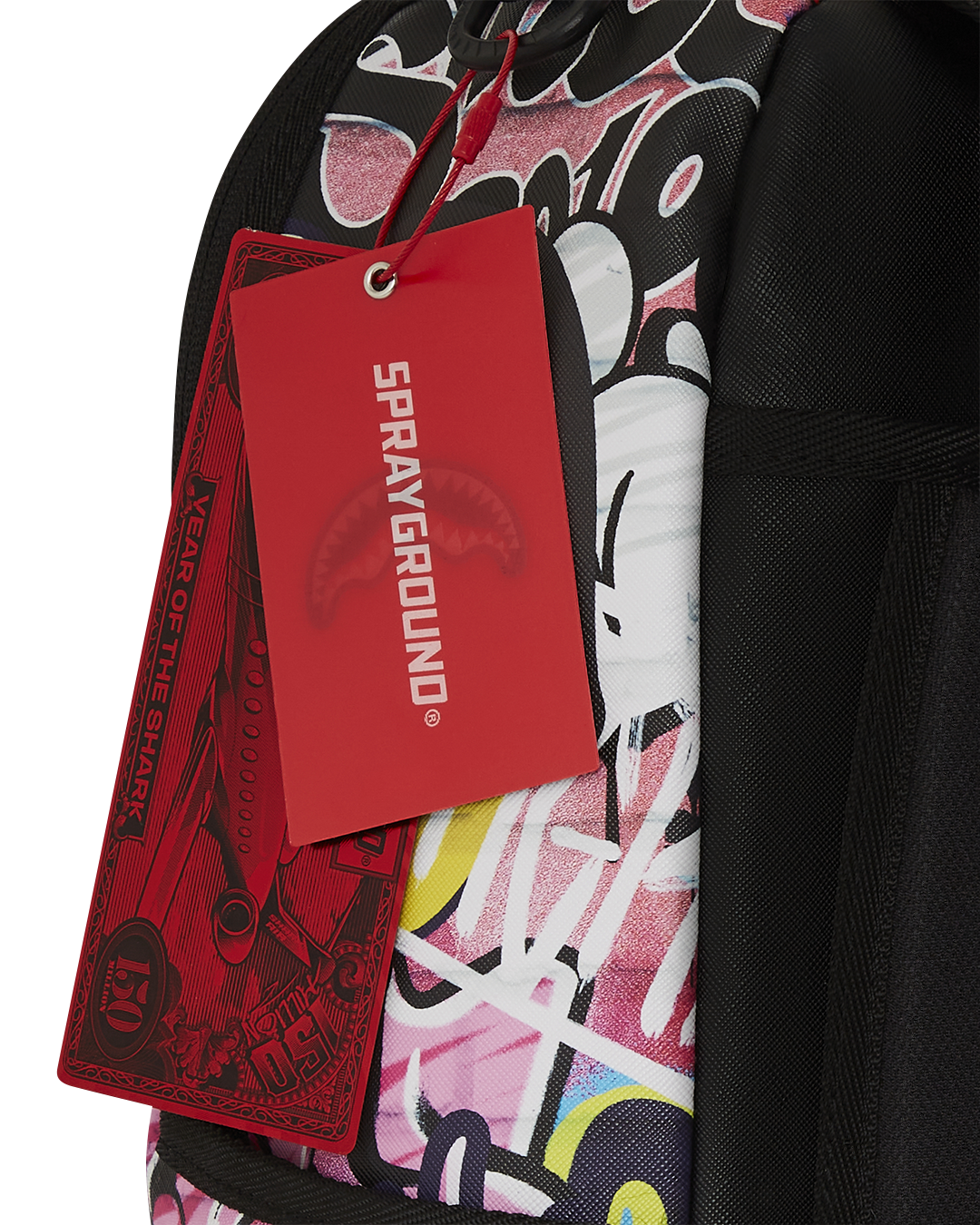 Front view of pink faux leather backpack showing main zipper and storage layout