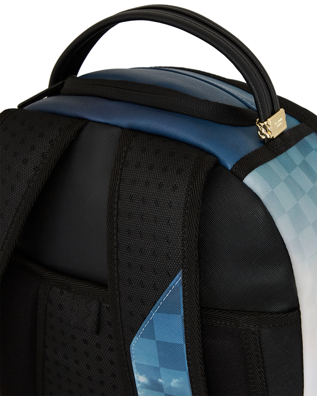 Interior shot of faux leather laptop backpack compartment with mesh organizer