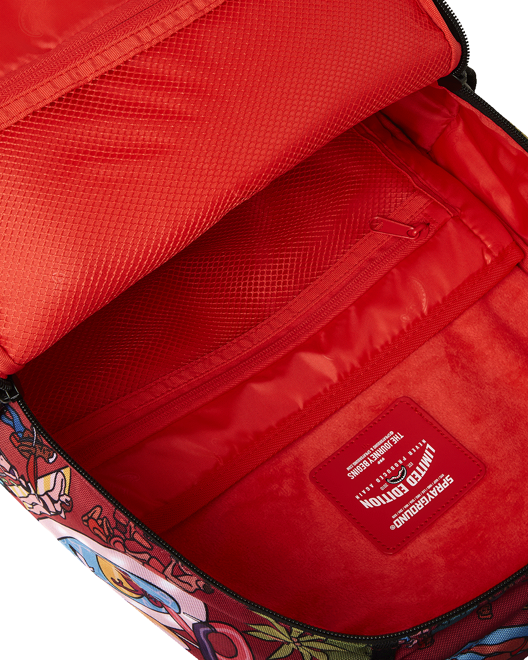 Back of the backpack featuring adjustable straps and gold zipper details.