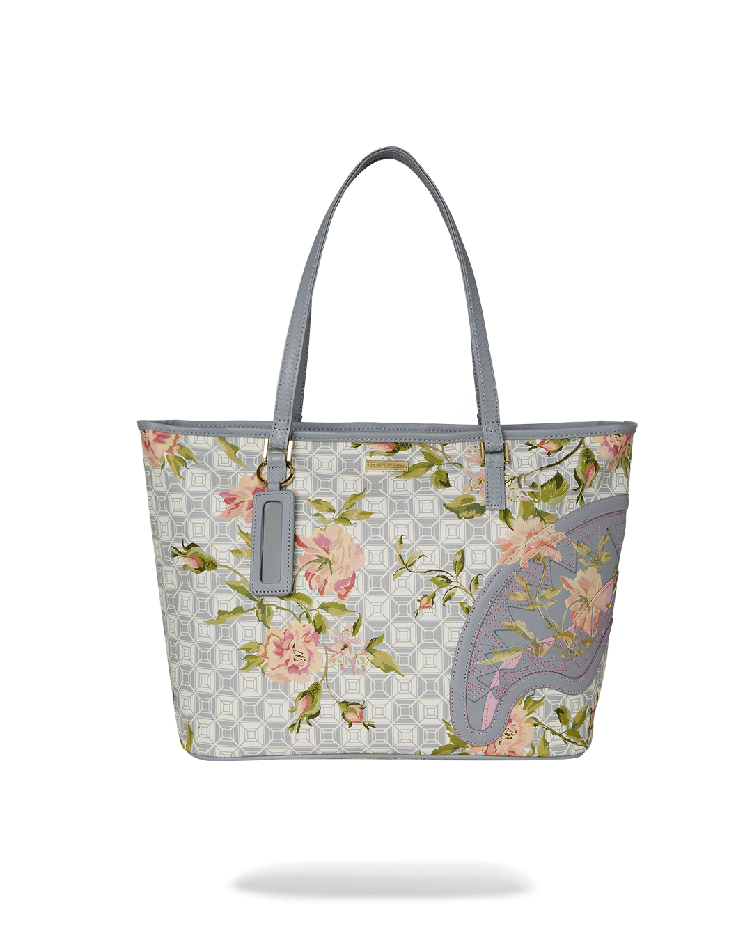 Front angle of the Sandflower collaboration tote bag showing double handles and urban design