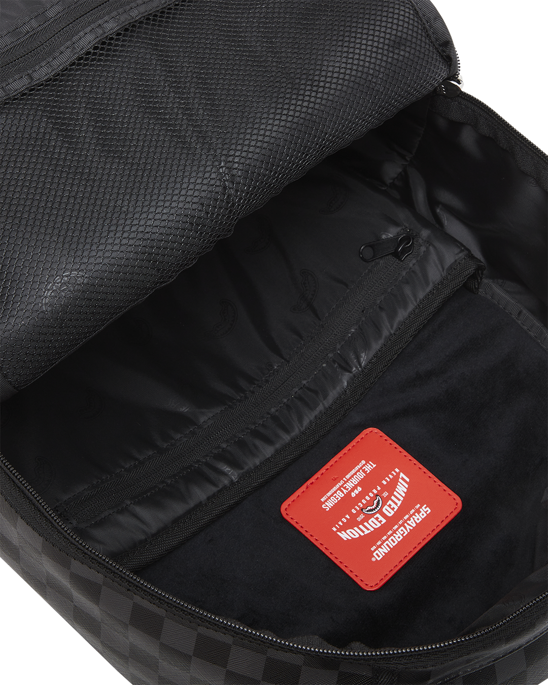 Faux leather backpack showcasing front zipper pocket and side pockets.