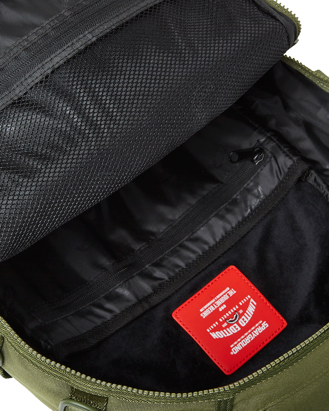 Interior view of military backpack highlighting laptop compartment and mesh organizers