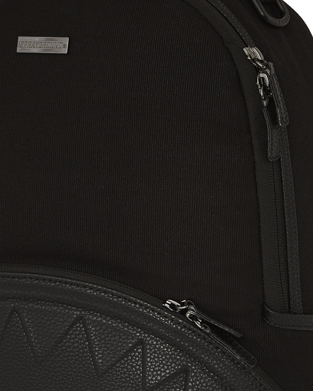 Canvas backpack with adjustable straps and gold zippers, perfect for travel and daily use.