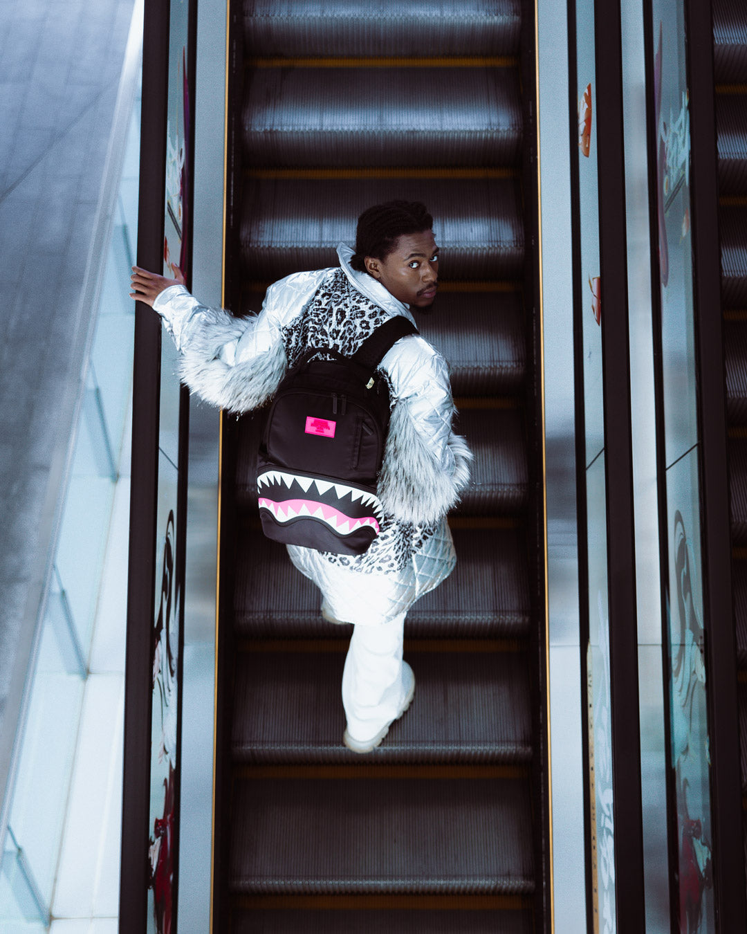 Sprayground Shark backpack with neon venom design, front view