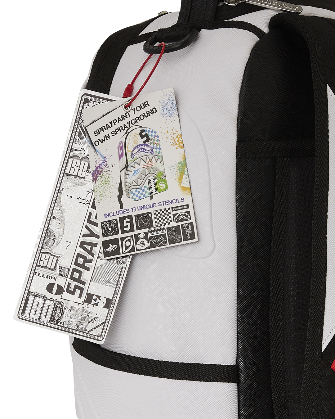 Custom graffiti artist backpack with stencil designs on urban street backdrop
