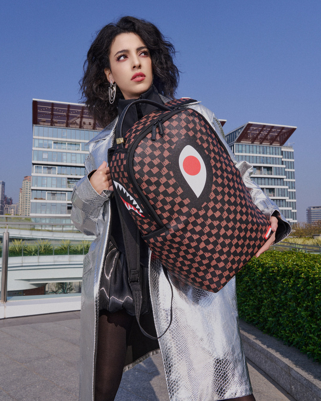Side view of the luxury backpack showing mesh back padding and adjustable straps