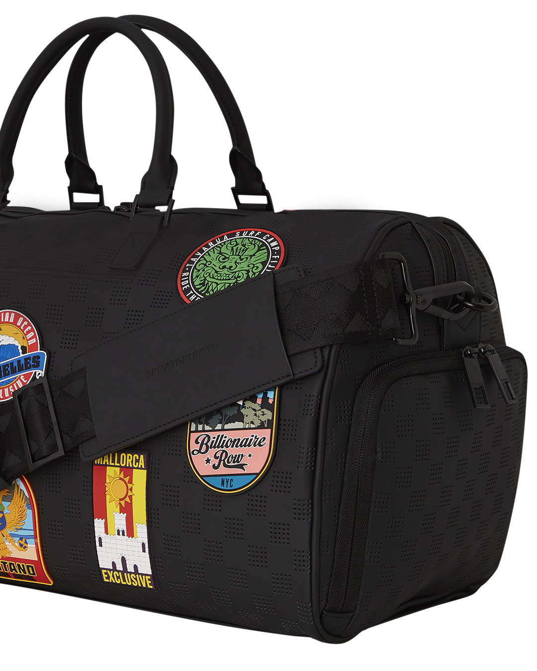 Close-up of the perforated PVC and rubber patches on the travel bag