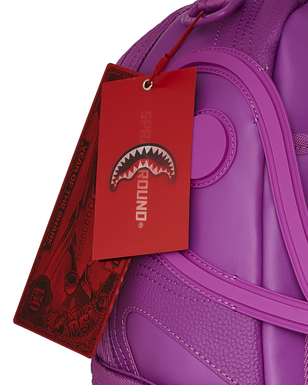 Backpack open showing velour laptop compartment and organizer pockets