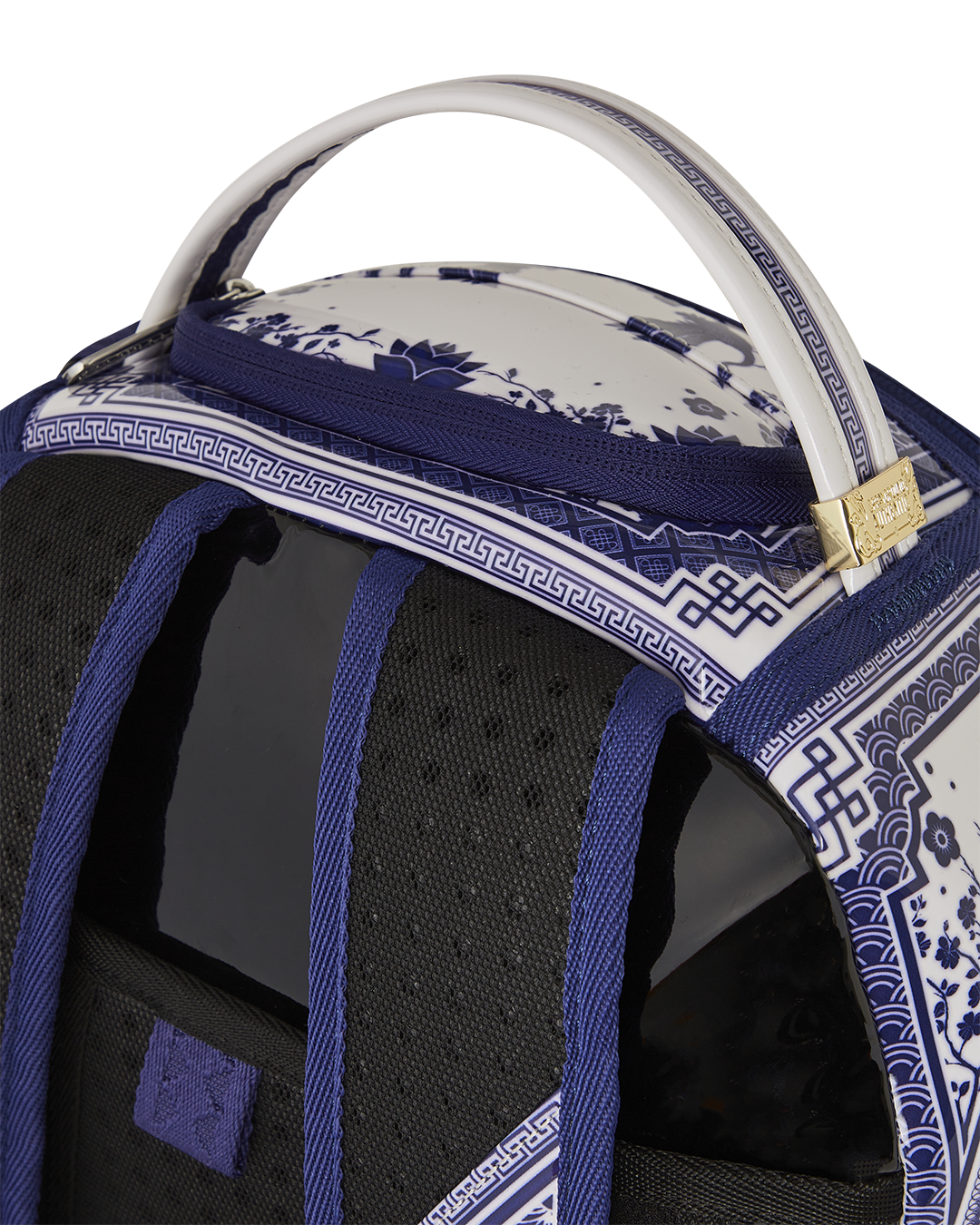 Interior shot of sprayground backpack pink design with velour laptop slot