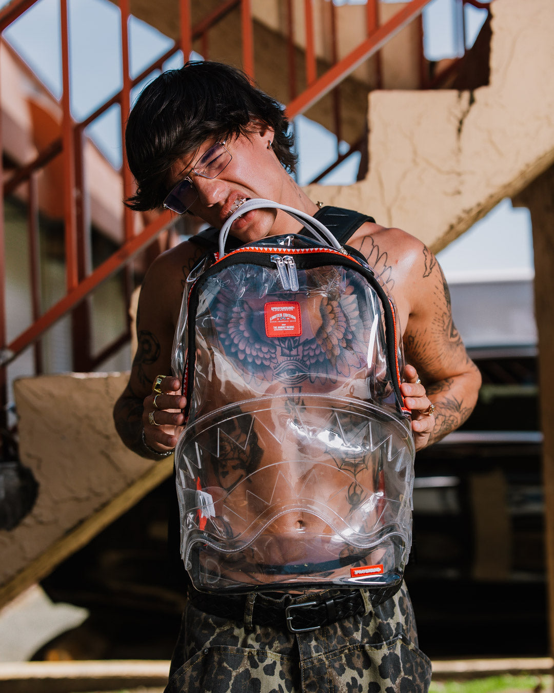 Side view of PVC backpack with adjustable straps and mesh padding
