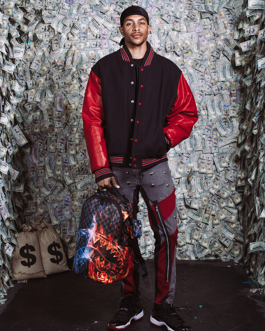 Backpack worn by a traveler in a cityscape, highlighting its sleek design and functionality.