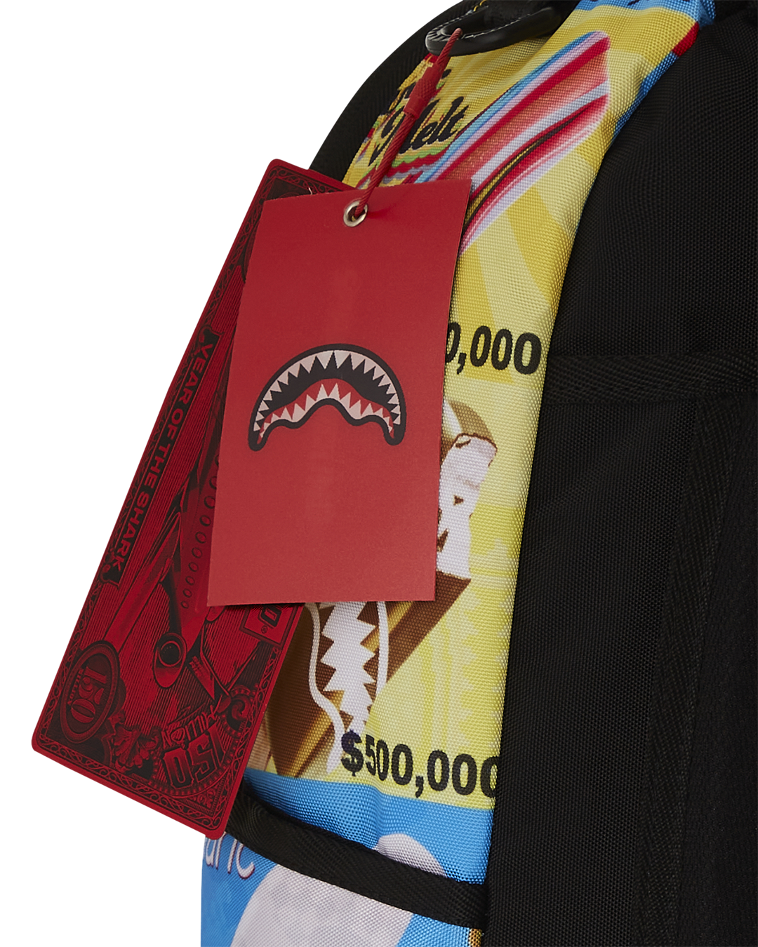 Sprayground backpack open to reveal velour laptop compartment and mesh organizer