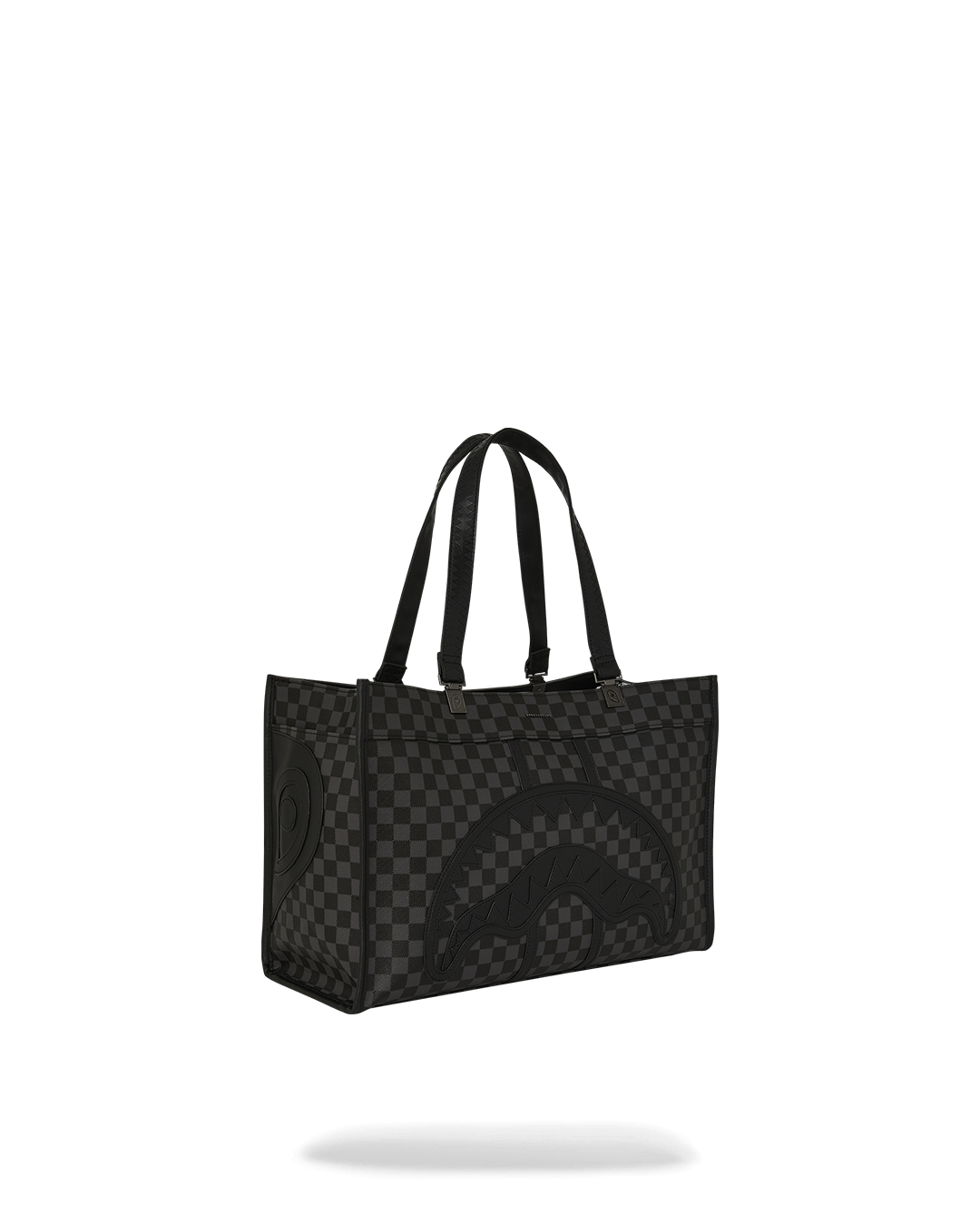 Midnight Chateau tote bag displayed on shoulder in a trendy urban environment.
