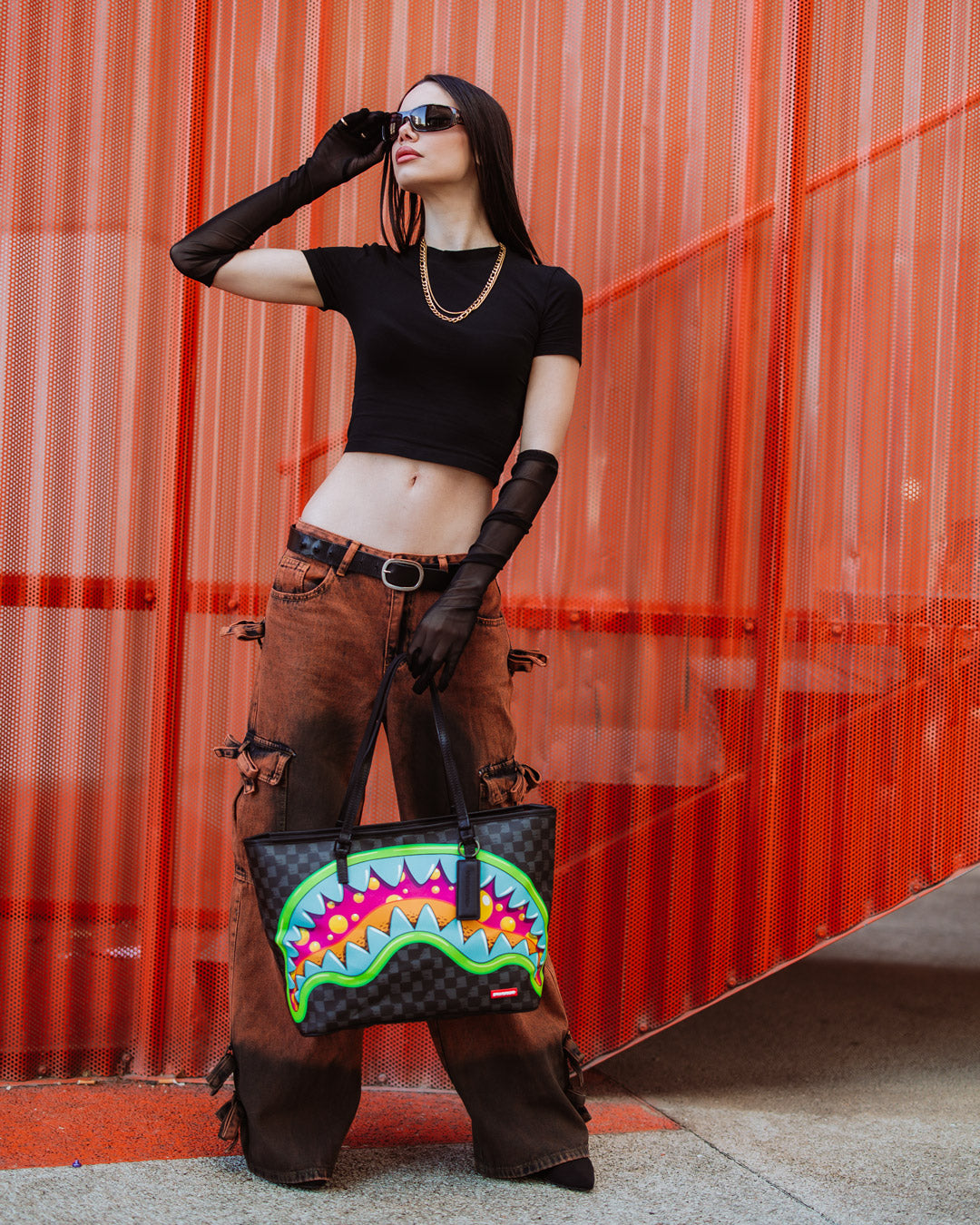 Sprayground faux leather tote bag with slime takeover print, ideal for daily use or travel