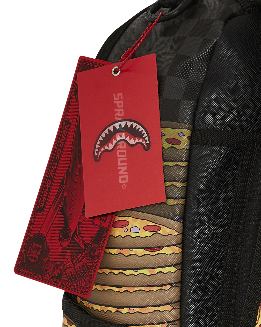 Side angle of the leather faux backpack showing Garfield and pizza graphic detail.