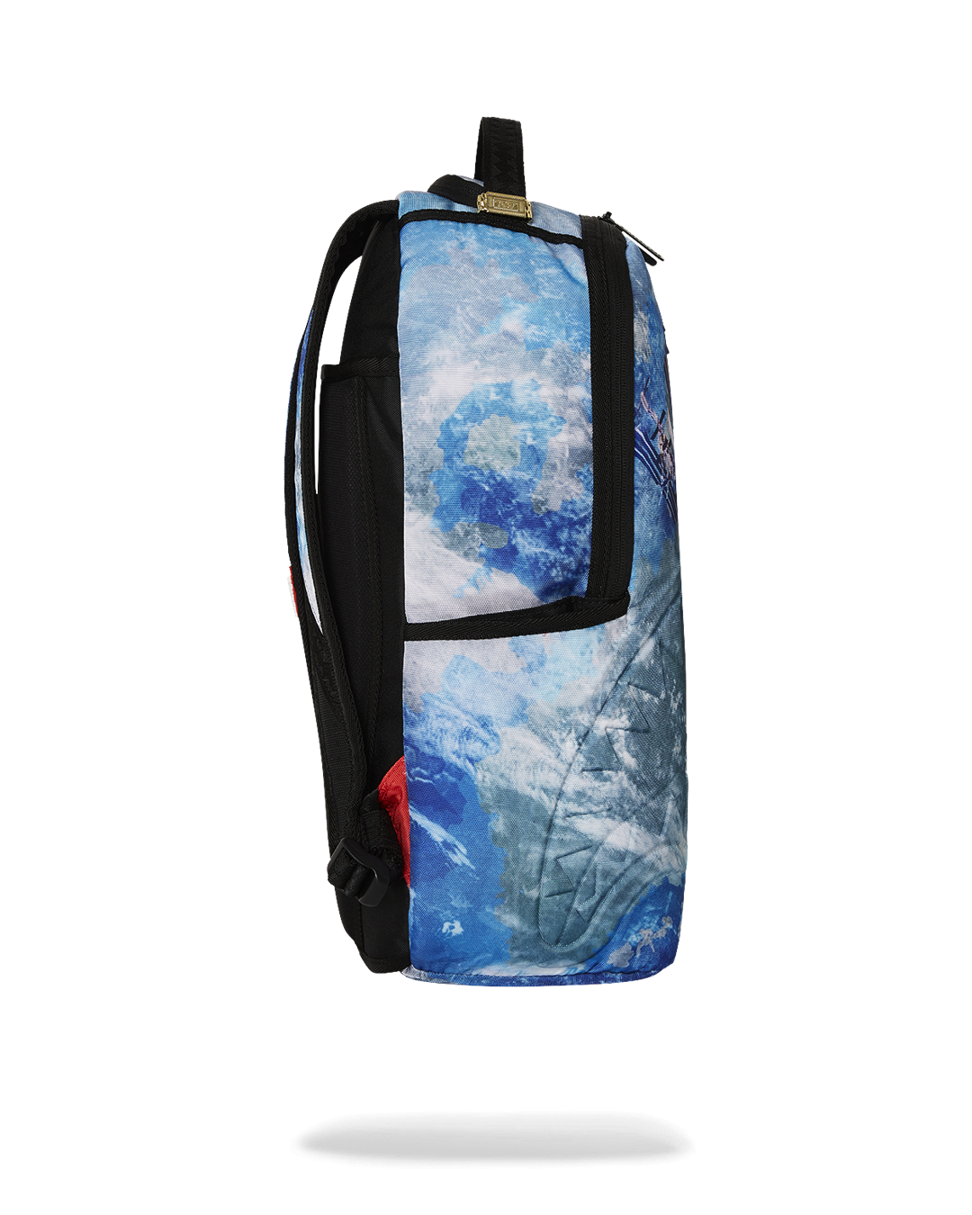 Sprayground NASA Collaboration Limited Edition Laptop Backpack being used by a traveler at an airport, highlighting its travel-friendly features.
