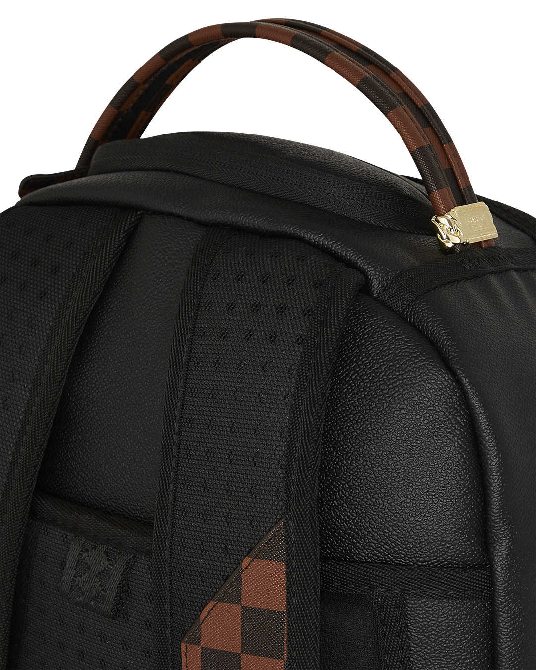 Close-up of embossed sharkmouth detail on faux leather backpack