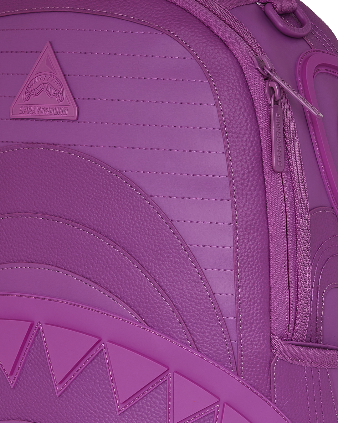 Murasaki faux leather backpack worn casually with a laptop inside