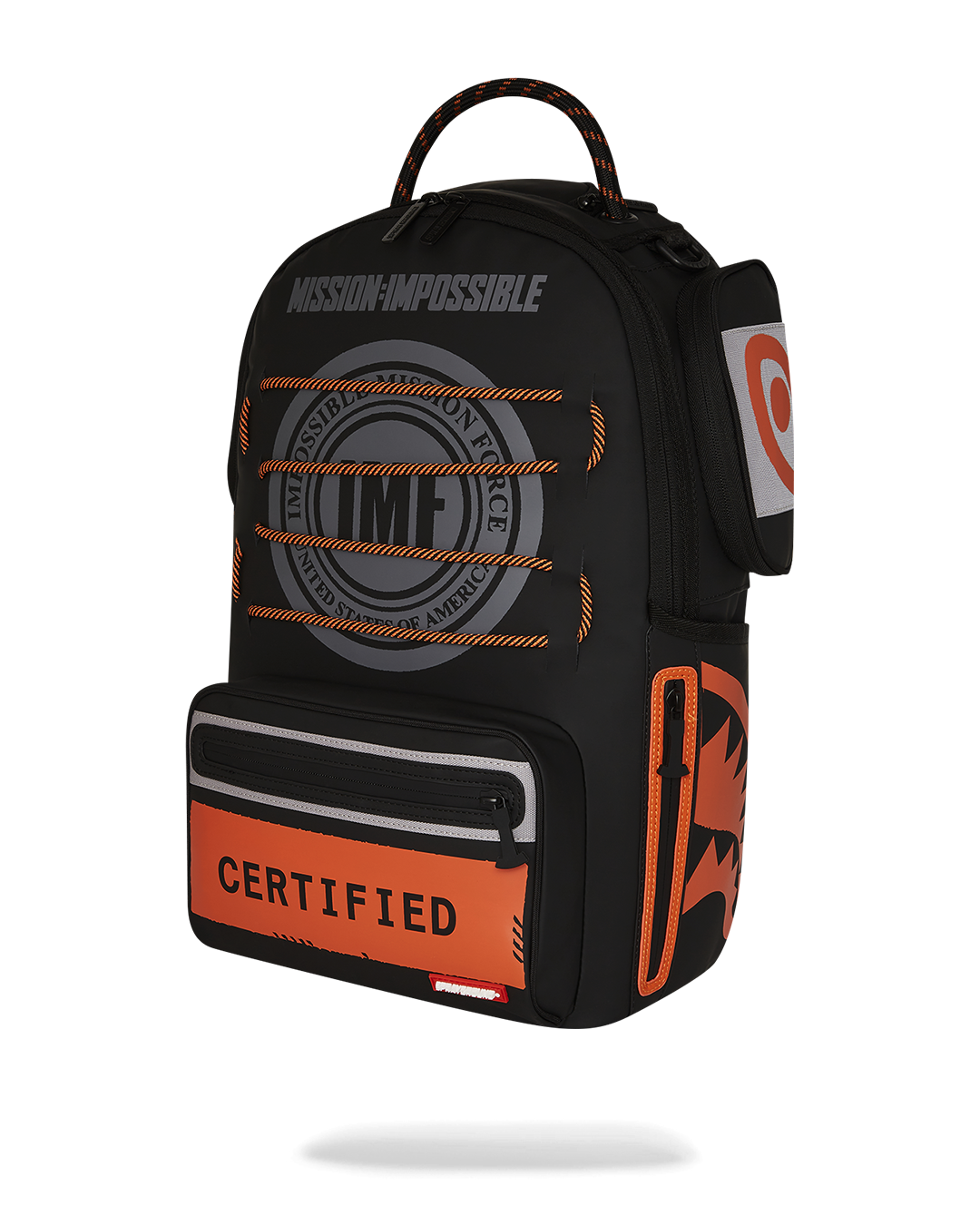 Close-up of gold zippers and metal hardware on the backpack