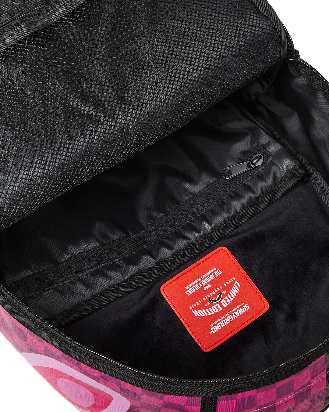 Side angle of the backpack displaying side pockets and adjustable straps