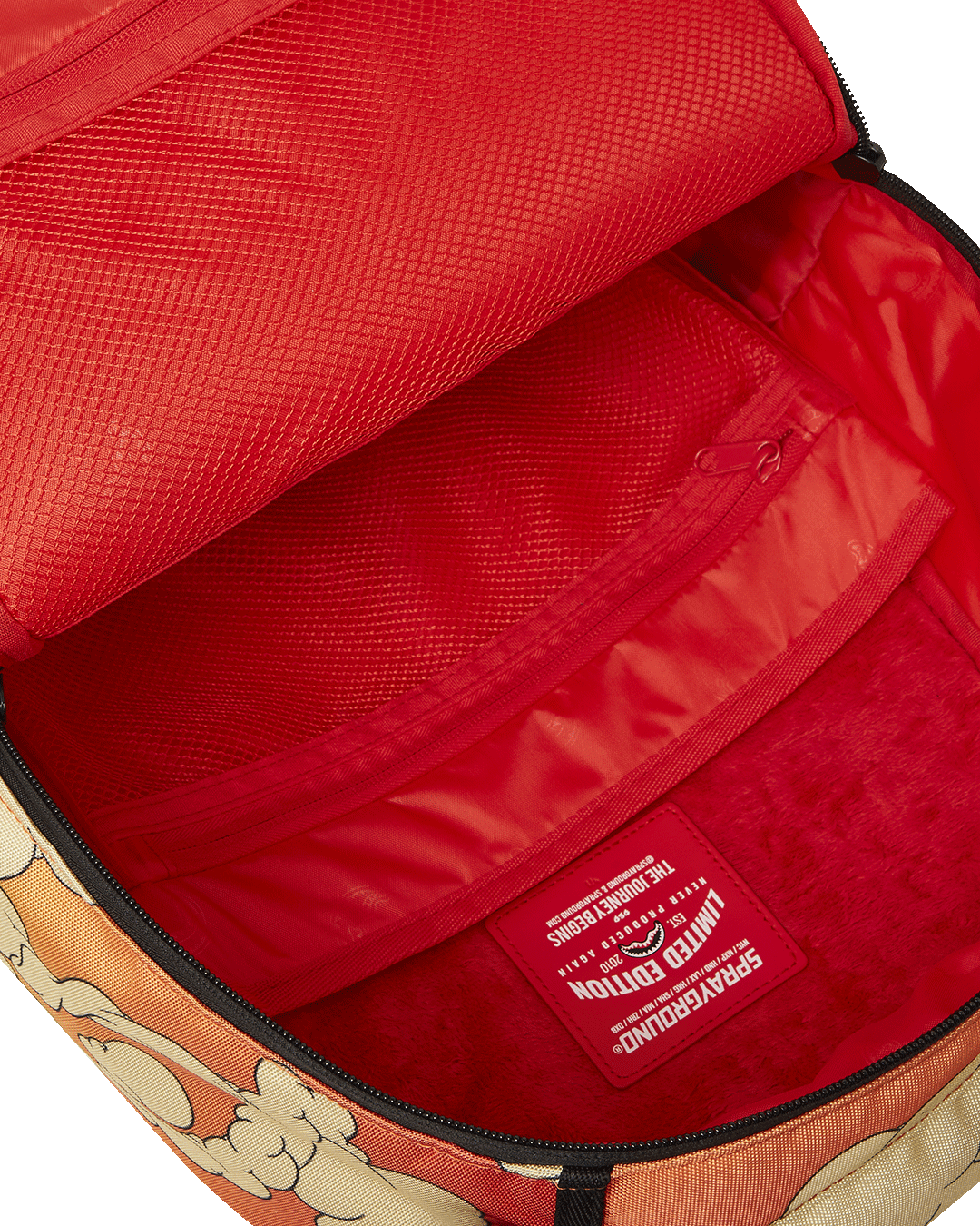 Interior shot showing dedicated velour laptop compartment and organizational pockets