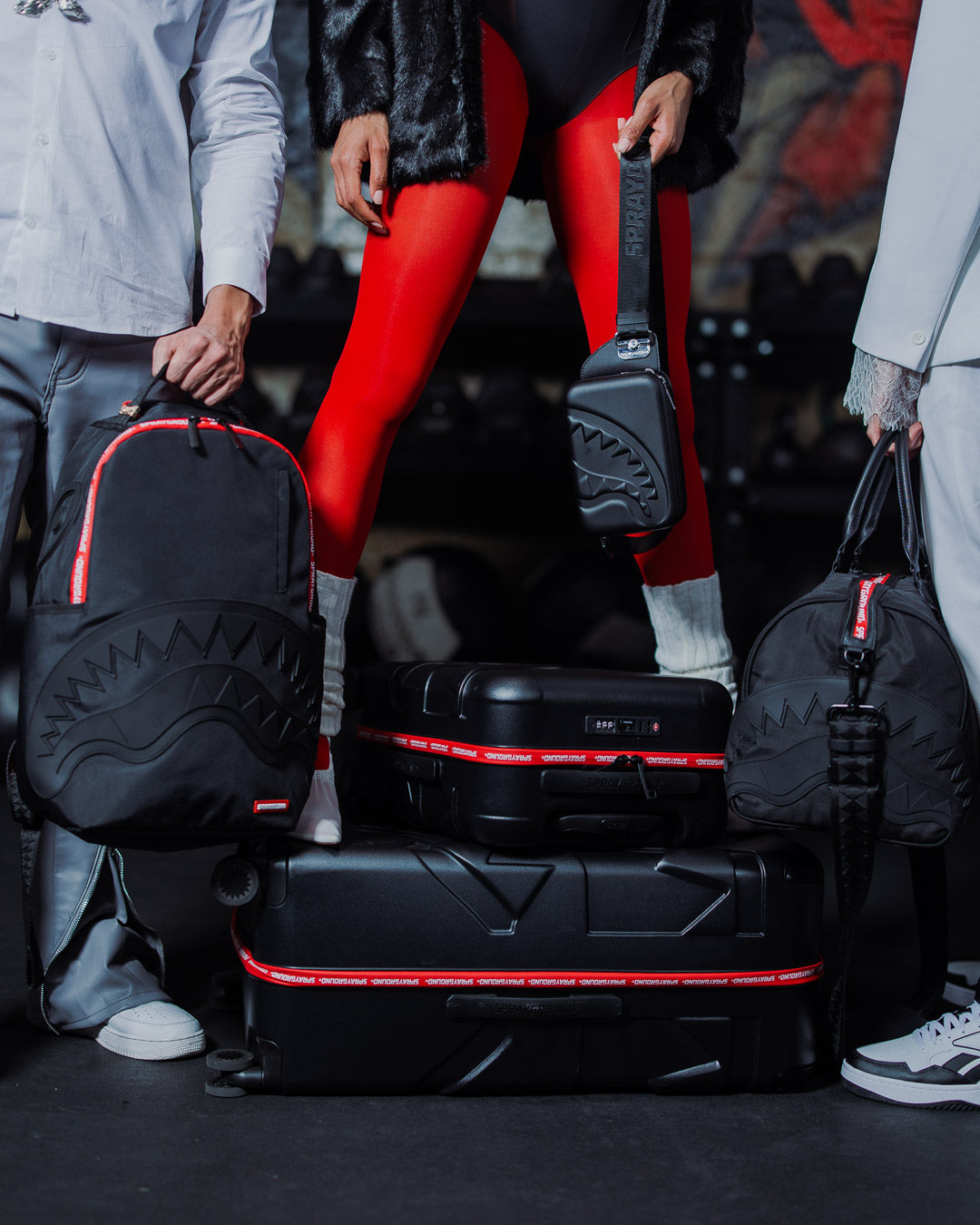 Ultimate travel duffle bag with gold zippers and adjustable straps.