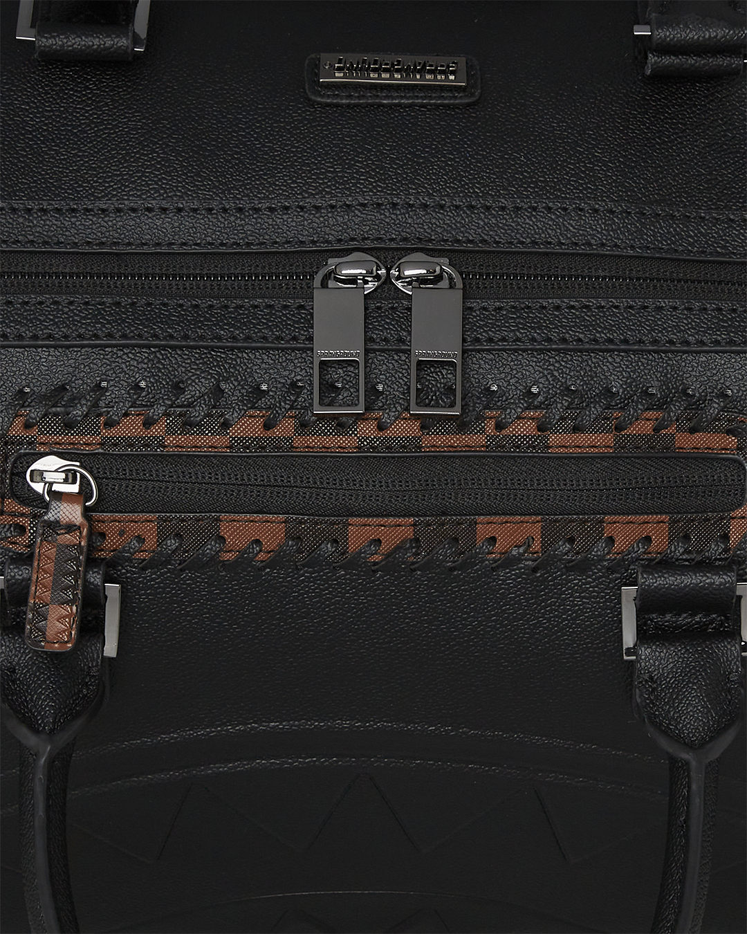 Checkpoint Royale Leather Duffle Bag with embossed sharkmouth details, perfect for golf travel