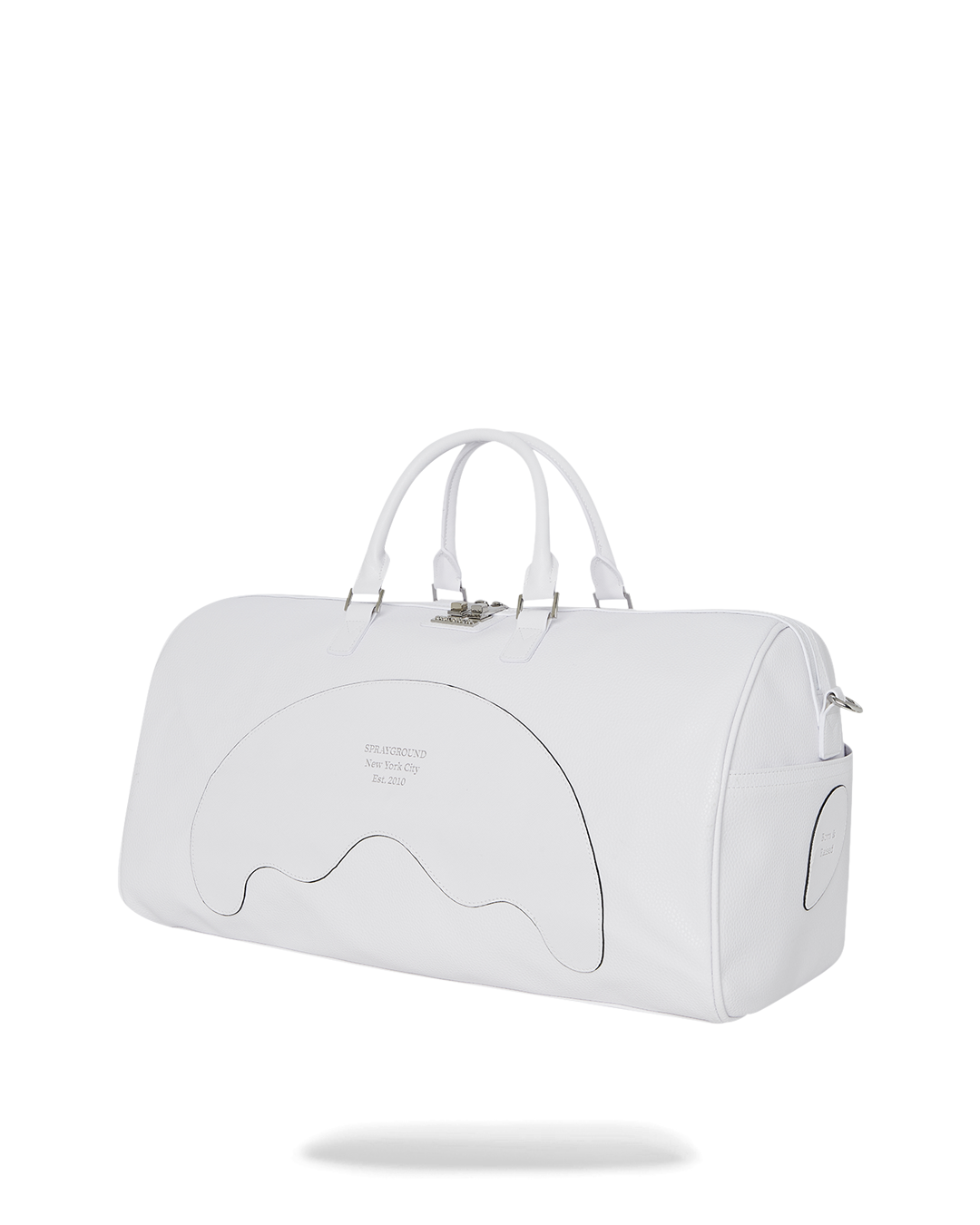 Close-up of the embossed sharkmouth design on the reflective duffle
