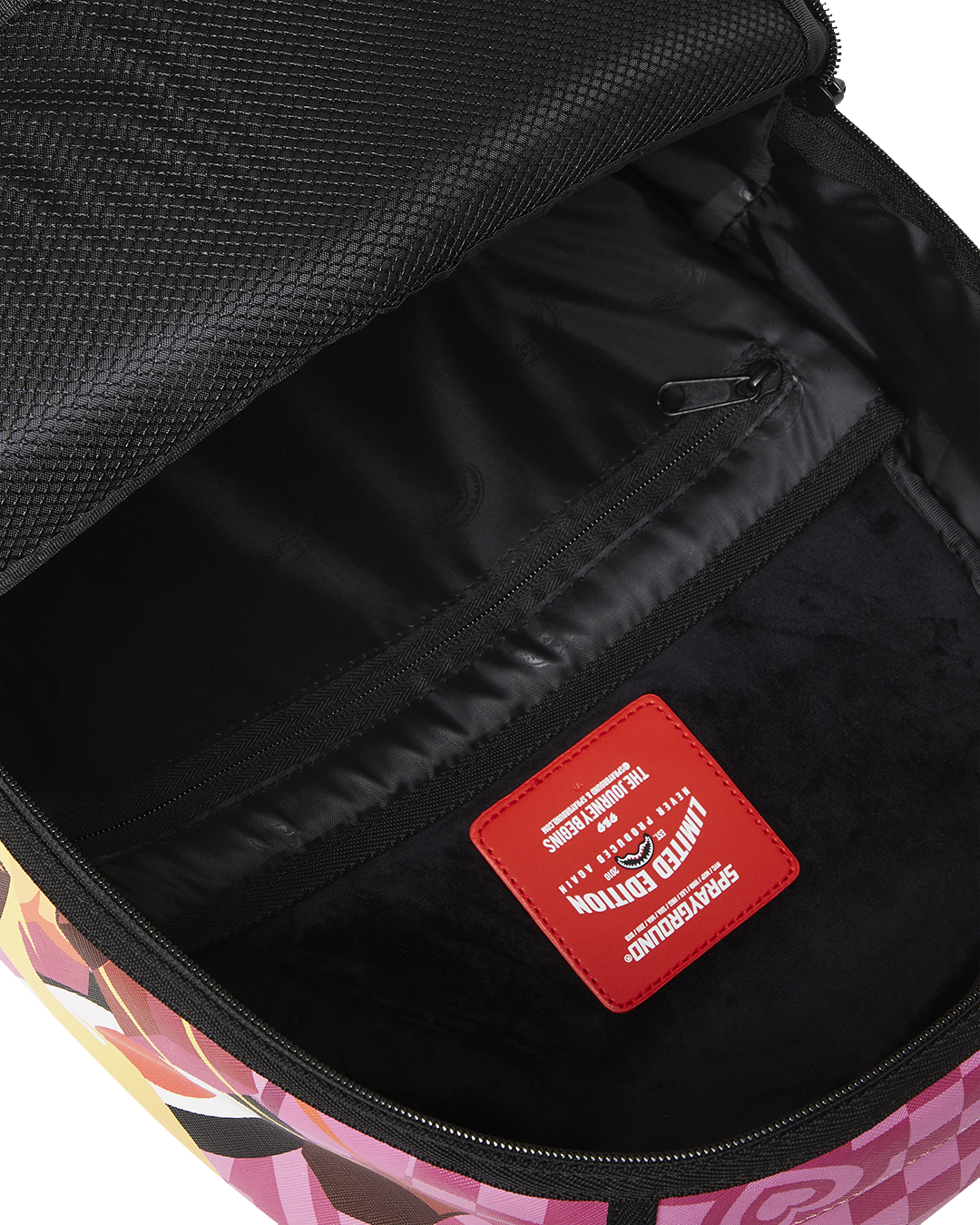 Interior of faux leather rucksack backpack with laptop and sunglass compartments