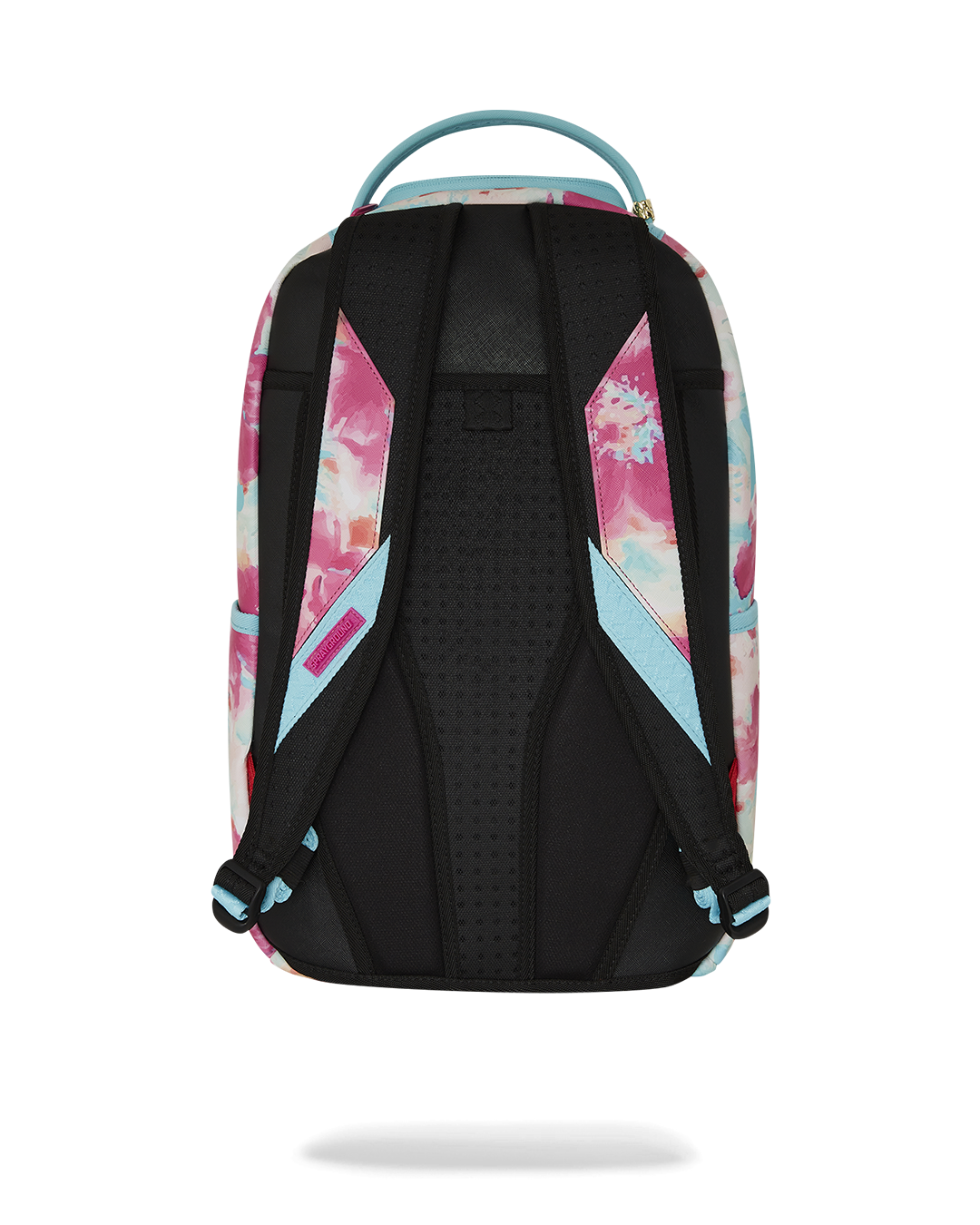 Angled view showing gold zipper detailing on faux leather backpack