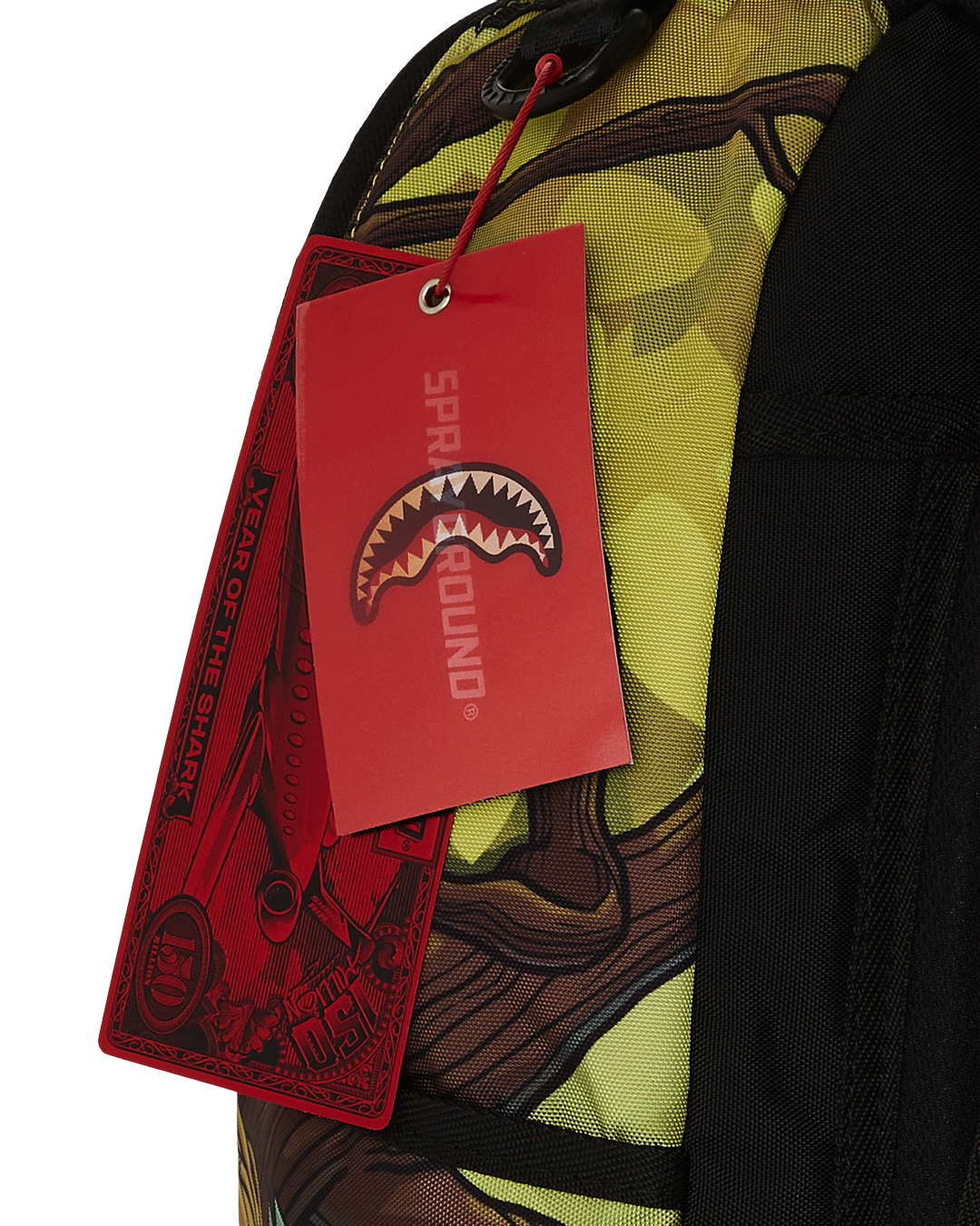 Front view of Tweety backpack cartoon showing zippered compartments and badge detail.