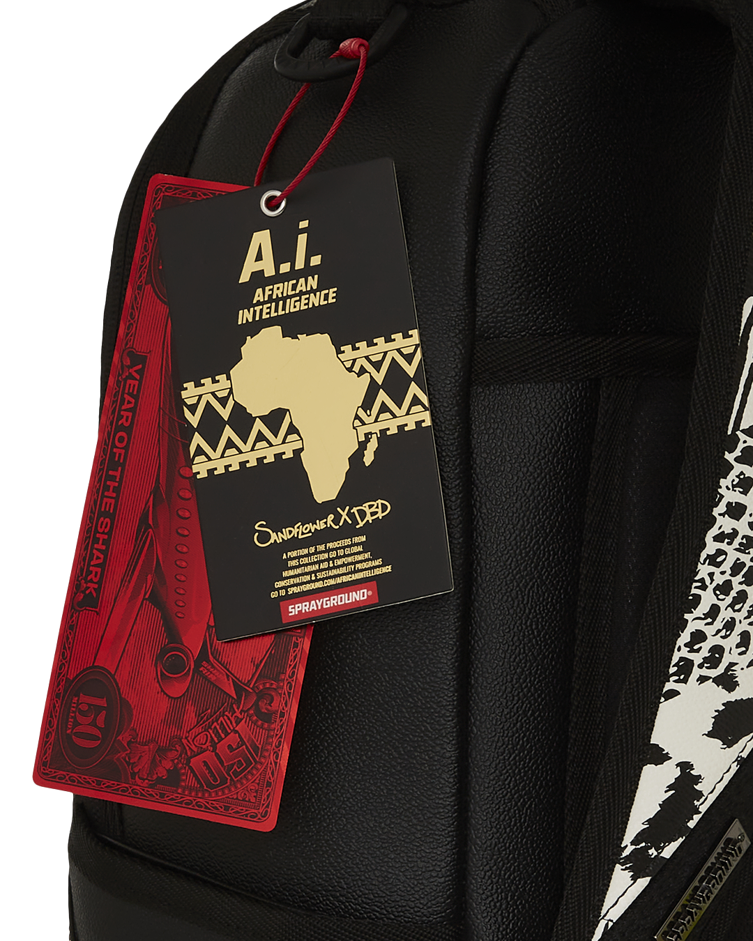 Close-up of the limited edition Sprayground backpack showcasing gold zippers and faux leather material