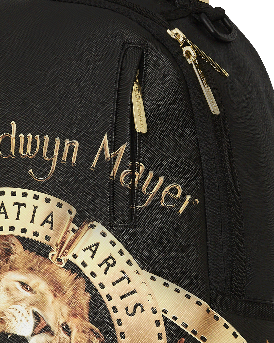 Top-down angle highlighting velour compartments and mesh-padded straps