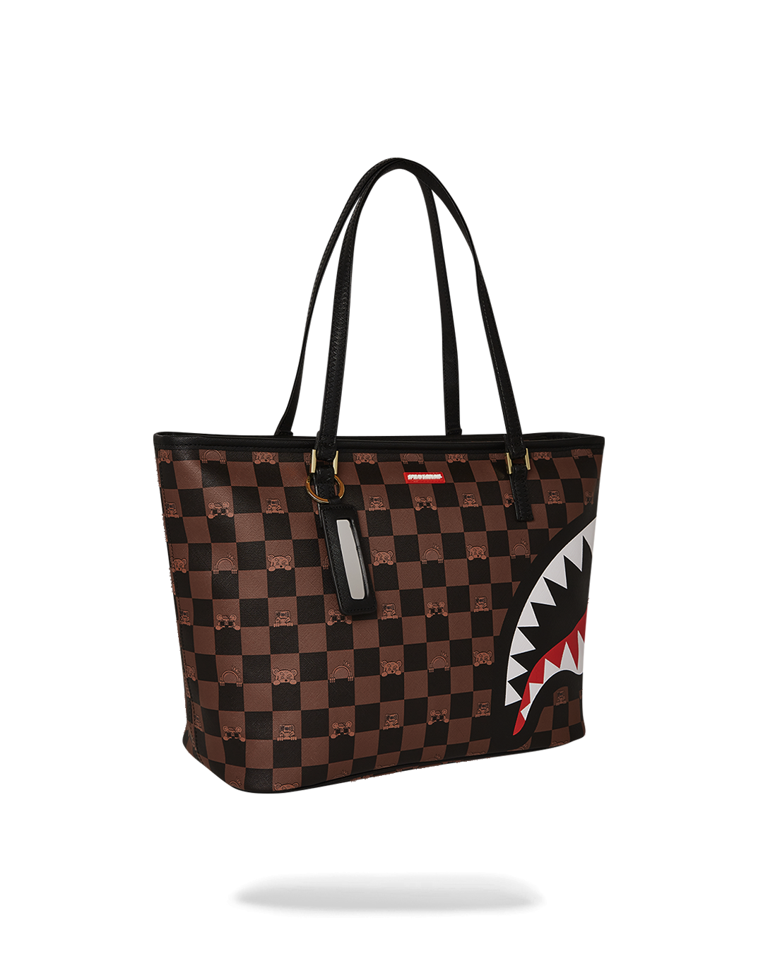 Sprayground faux leather bag with spacious interior pocket shown during use