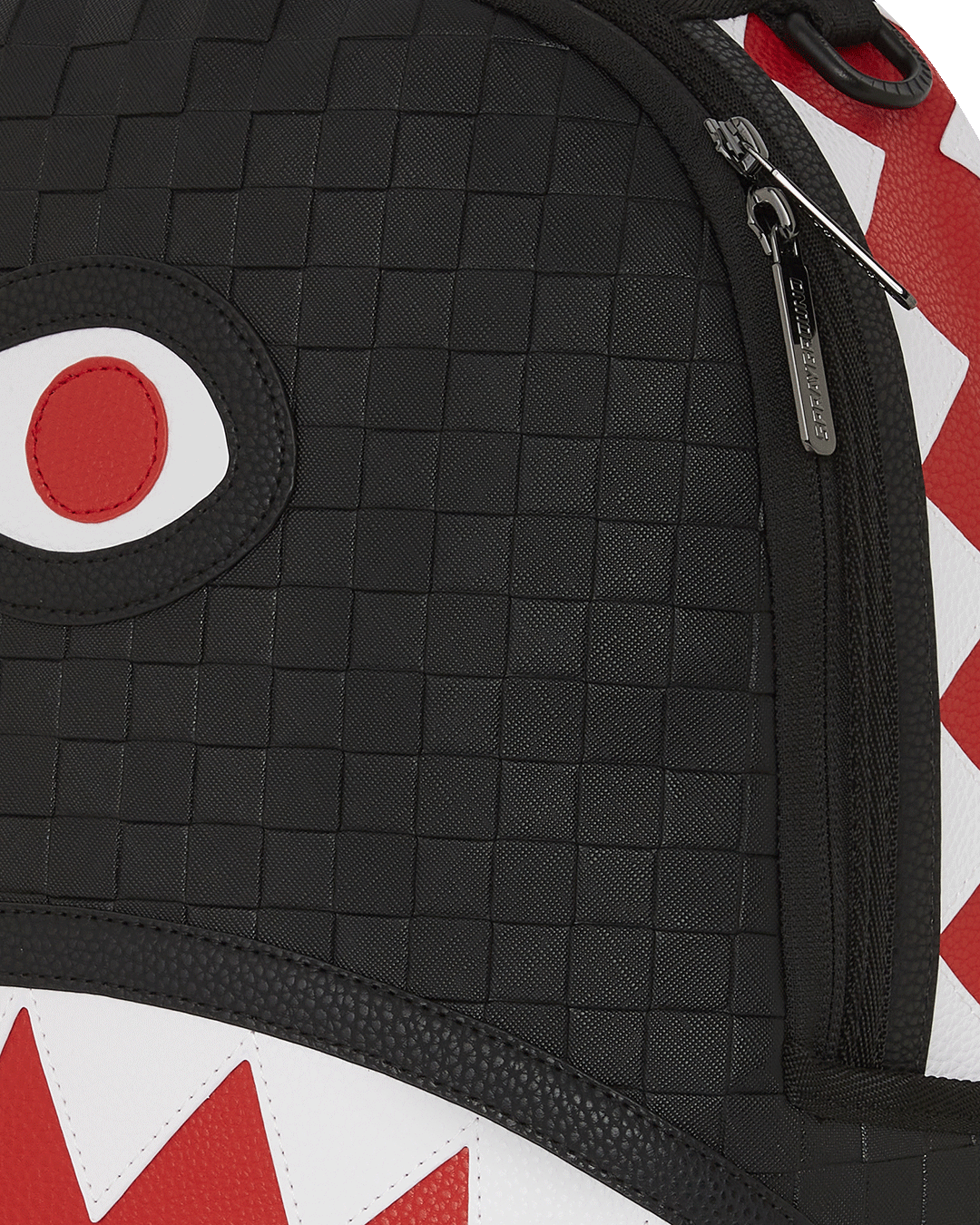 Faux leather backpack with embossed check pattern and gold zippers for travel and daily use