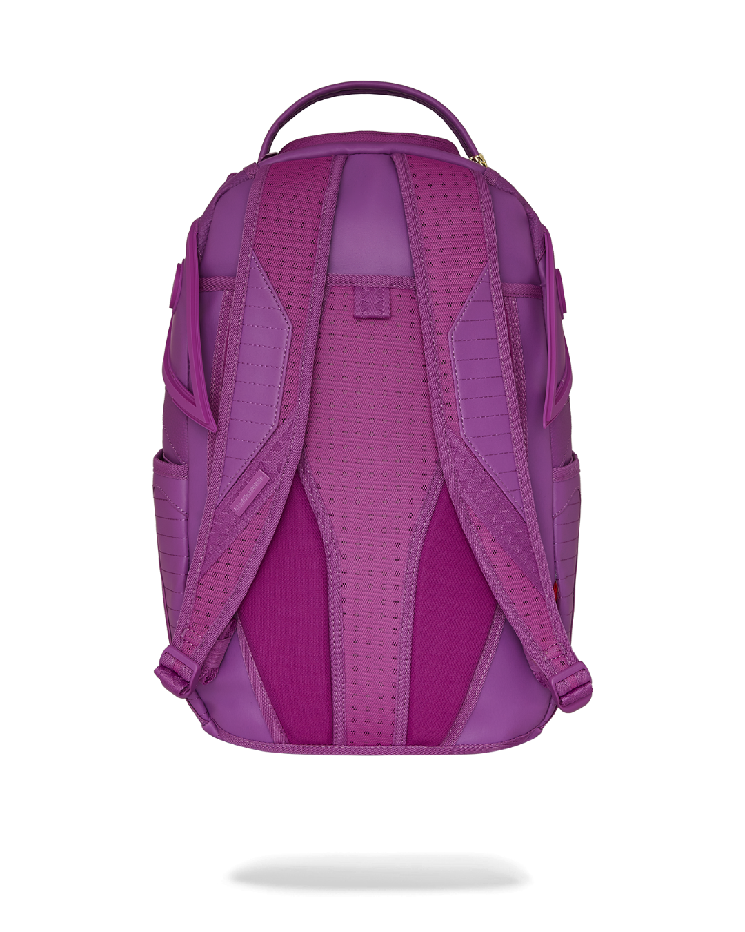 Murasaki faux leather backpack worn casually with a laptop inside