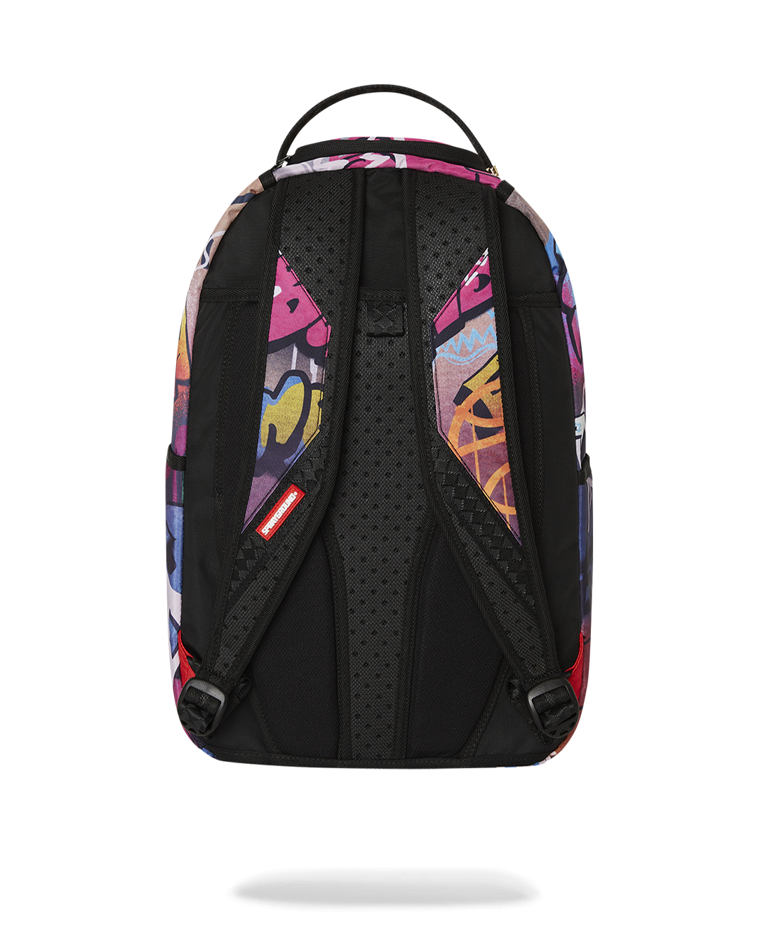 Close-up of the backpacks front zipper pocket with gold hardware