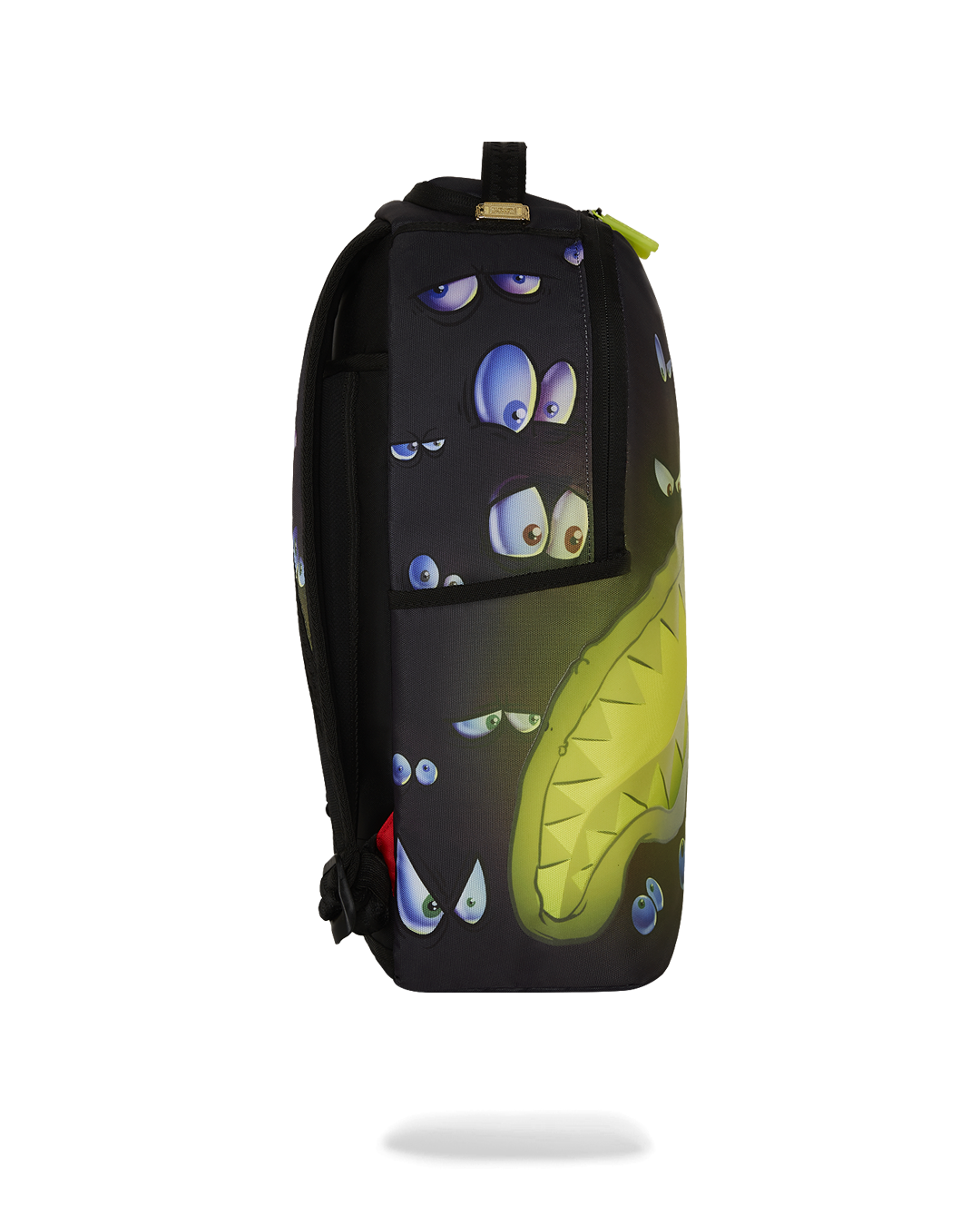 Front view of Sprayground backpack pink with glowing mouth design.
