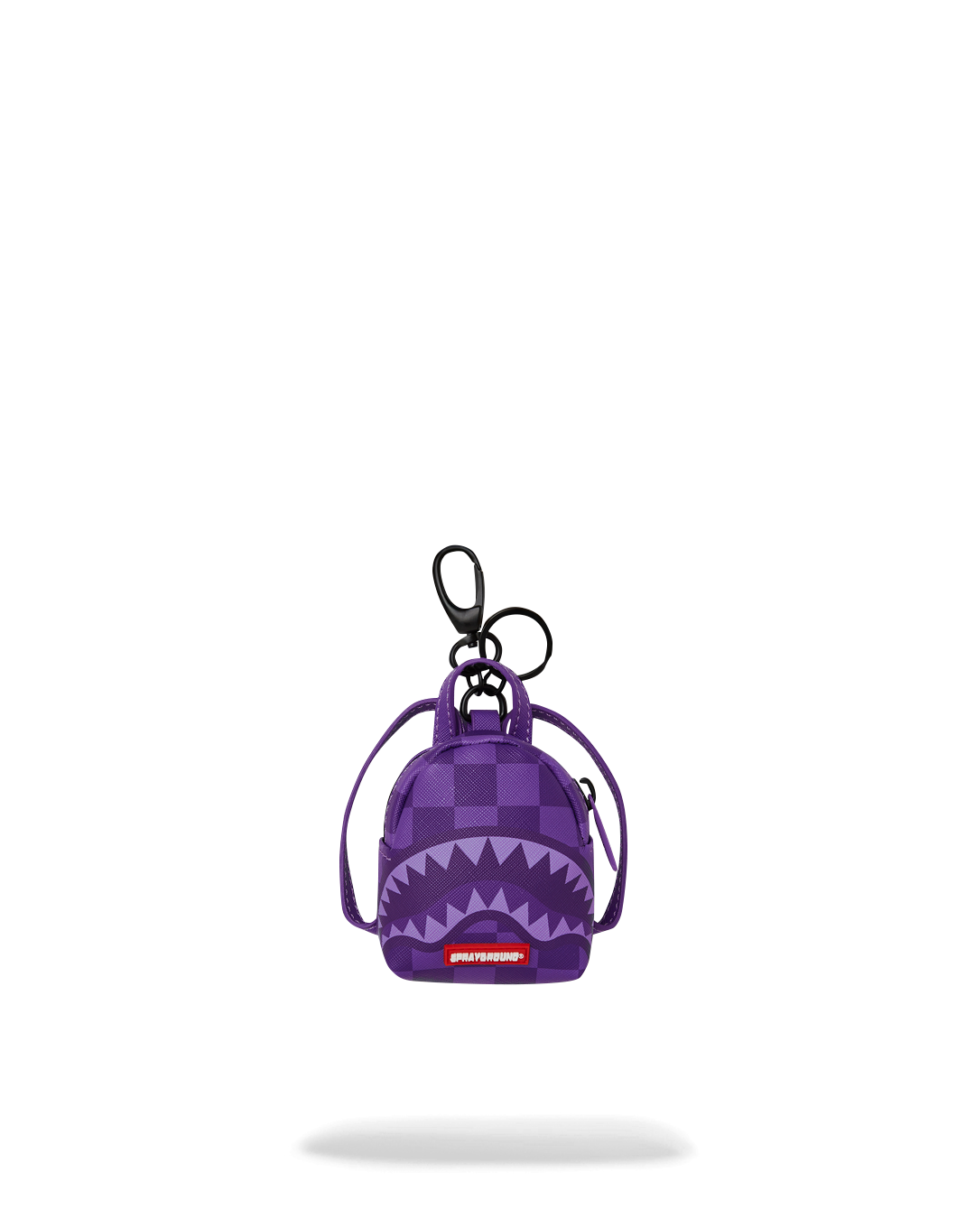 Close-up of the mini backpack keychain showing its stylish design and keyring attachment